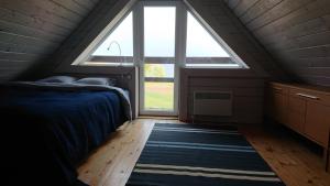 Postel nebo postele na pokoji v ubytování Seaside cottage