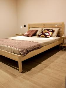 Кровать или кровати в номере La Dimora apartments
