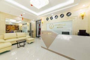 a lobby of a store with couches and a counter at EVEREST HOTEL in Hanoi