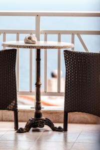 A seating area at Casa bianca μεζονέτα με θέα στη θάλασσα