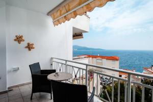 Μπαλκόνι ή βεράντα στο Casa bianca μεζονέτα με θέα στη θάλασσα
