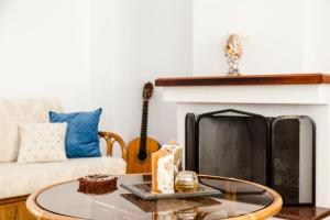 A seating area at Casa bianca μεζονέτα με θέα στη θάλασσα
