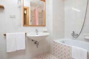 Koupelna v ubytování Appartamenti Corte Residence