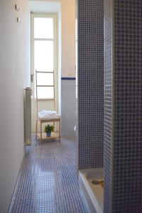 Et badeværelse på Dimora Paternò