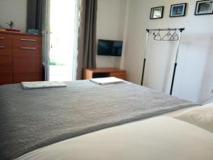 Postelja oz. postelje v sobi nastanitve Apartments Božito