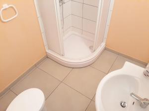 Kopalnica v nastanitvi Apartments Božito