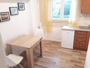 Kuhinja oz. manjša kuhinja v nastanitvi Apartments Božito