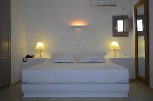Cama ou camas em um quarto em Mar Inn Hotel