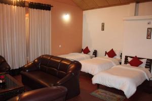 Postel nebo postele na pokoji v ubytování Takdah Heritage Bungalow no 10