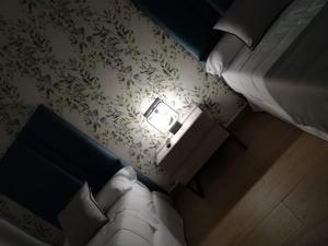 A bed or beds in a room at Aljibe Casa Rural
