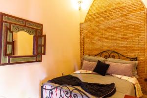 Letto o letti in una camera di Riad le dromadaire bleu by Weekome