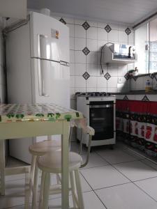 Kuchyň nebo kuchyňský kout v ubytování Casa de temporada - Arraial do Cabo