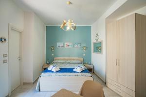 Postel nebo postele na pokoji v ubytování Bebcatia