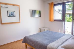 Postel nebo postele na pokoji v ubytování Rooms Stolfa