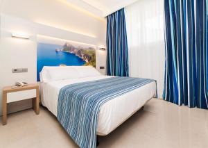 
Cama o camas de una habitación en Globales Playa Estepona
