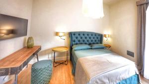 Postel nebo postele na pokoji v ubytování Domus D'Angelo B&B