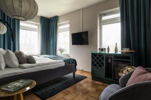 TV a/nebo společenská místnost v ubytování Näsby Slott