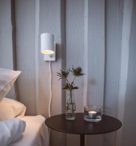 Postel nebo postele na pokoji v ubytování Hotell Käringön