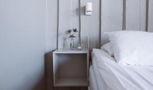Postel nebo postele na pokoji v ubytování Hotell Käringön
