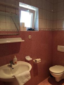 Kúpeľňa v ubytovaní Green Park Apartment