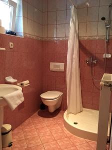 Kúpeľňa v ubytovaní Green Park Apartment