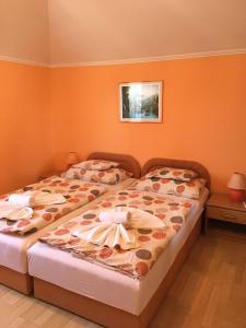 Posteľ alebo postele v izbe v ubytovaní Green Park Apartment