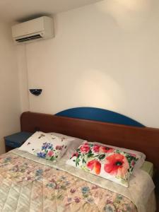 Postel nebo postele na pokoji v ubytování FUNTANA-MIA ROOMS B&B