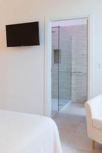 TV a/nebo společenská místnost v ubytování B&B Casale Savini