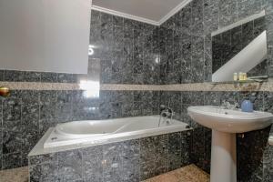 Koupelna v ubytování Vila Lucia + 33 fotografií