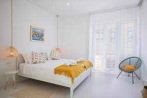 Postel nebo postele na pokoji v ubytování Twins Idola Apartments