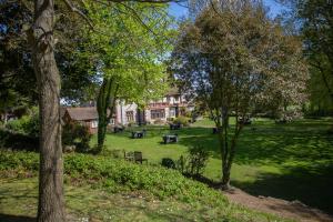 A garden outside Dales Country House Hotel 