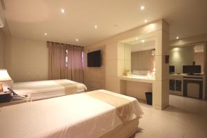 Cama o camas de una habitación en Sono Hotel