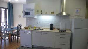 Kuchyňa alebo kuchynka v ubytovaní Casa Armas A, en Zocodover, Casco Histórico
