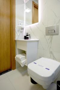 Ένα μπάνιο στο Kartal Palace Taksim Square FAMILY HOTEL