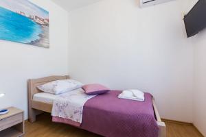 Posteľ alebo postele v izbe v ubytovaní Kelava Rooms