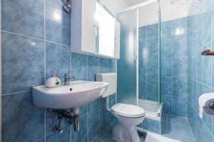 Kúpeľňa v ubytovaní Kelava Rooms