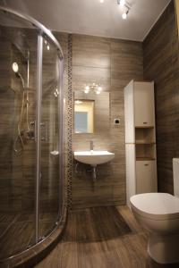 Łazienka w obiekcie ApartDębki