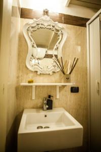 Ванна кімната в Suite Re Riccardo