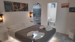 Posteľ alebo postele v izbe v ubytovaní Grey Rooms Naxos