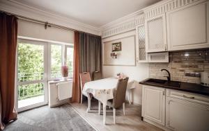 Η κουζίνα ή μικρή κουζίνα στο Апартаменты LUXURY LAVANDER