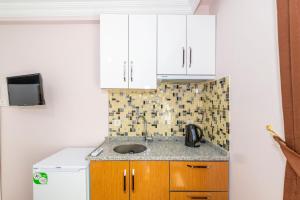 A kitchen or kitchenette at Tavra hotel