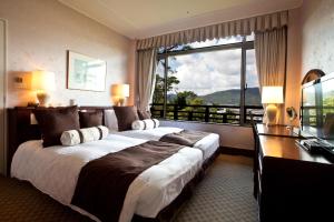 Katil atau katil-katil dalam bilik di Gamagori Classic Hotel