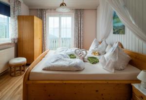 A bed or beds in a room at Naturkräuterhaus Eder