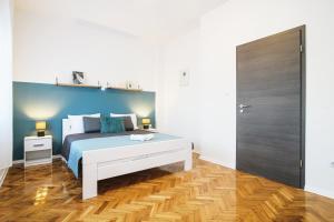 Postel nebo postele na pokoji v ubytování Peppermint Zadar