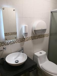 حمام في Apartments and Rooms Distecon