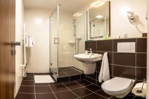 Kúpeľňa v ubytovaní Bohemia Inn Hotel