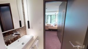 Postel nebo postele na pokoji v ubytování White Pearl Apartment 2.05
