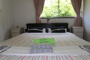 Letto o letti in una camera di JAS HOTEL TAKAYAMA