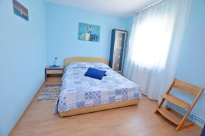 Postel nebo postele na pokoji v ubytování Apartment Evan