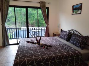 Кровать или кровати в номере Samui Hills